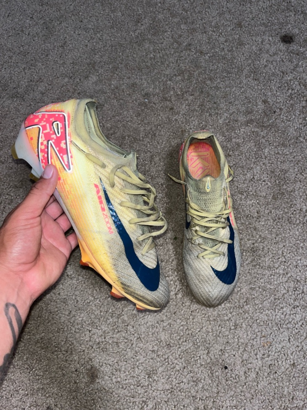 Nike Soccer Cleats in Yellow with Navy Swoosh and Pink Heel Accents